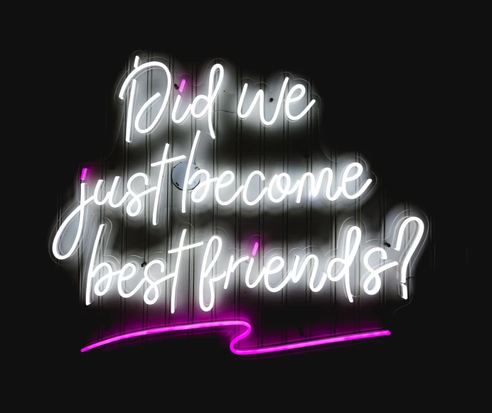 neon sign with the words did we just become best friend?