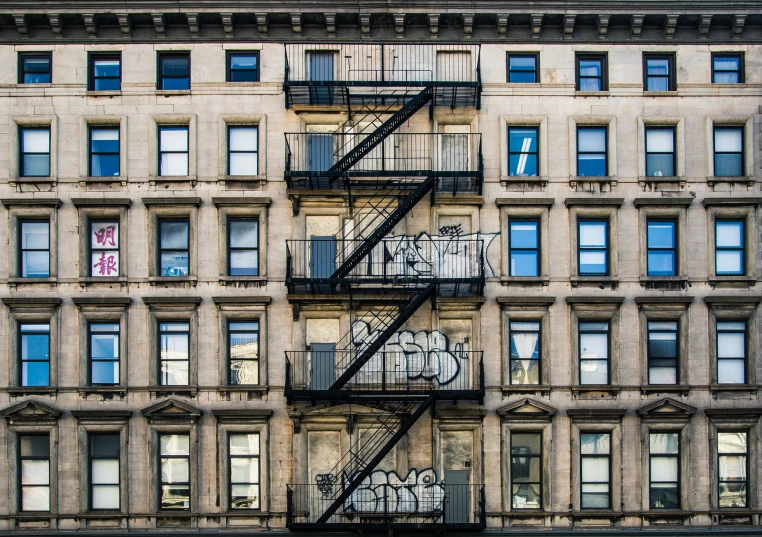 a fire escapesor on a building on the corner