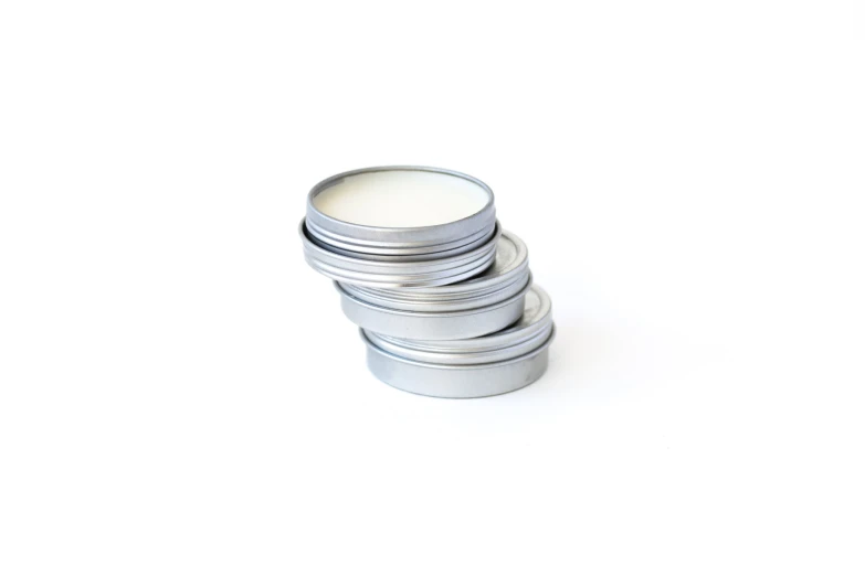 stack of five silver containers on white background