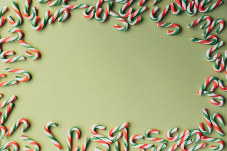 green and white text made up from candy canes