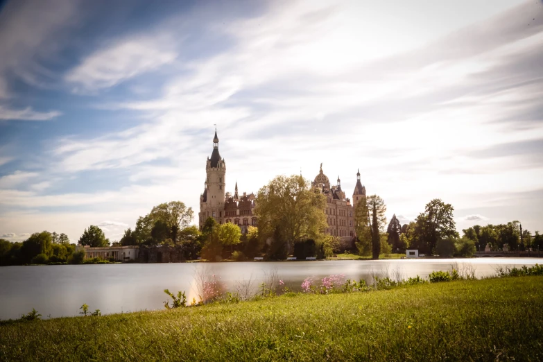 this is a very nice view of a castle by the lake