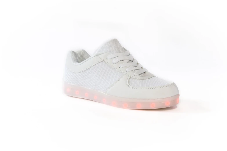 the back of white sneakers with red lights on it