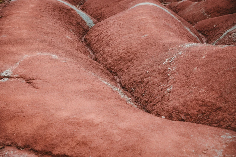 red and white dirt near the ground with different shapes