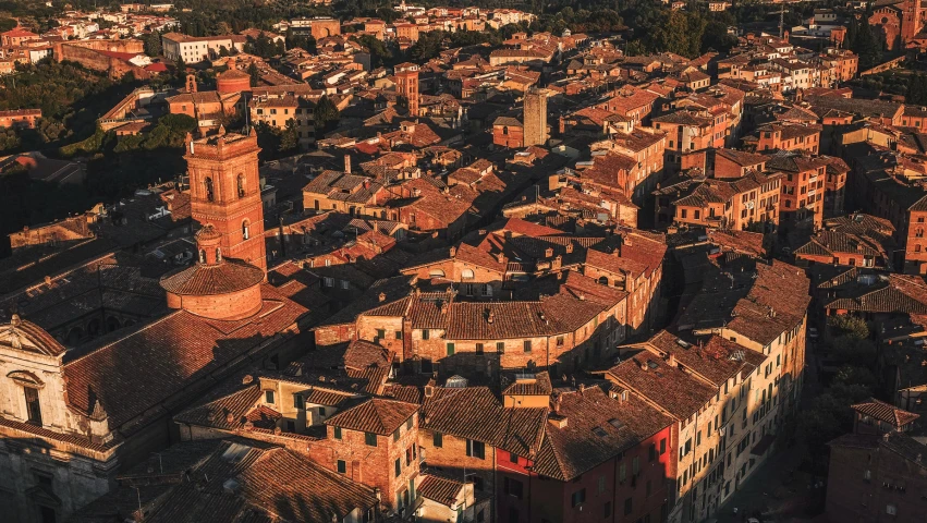 an old city with several towers and rooftops