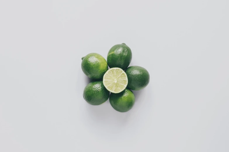 limes with lime wedges arranged in the shape of a flower