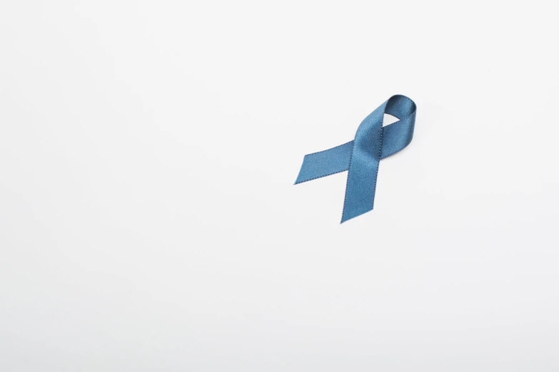 a blue ribbon against a white background