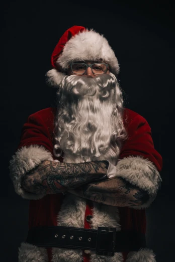 a man dressed in santa claus, holding a gun