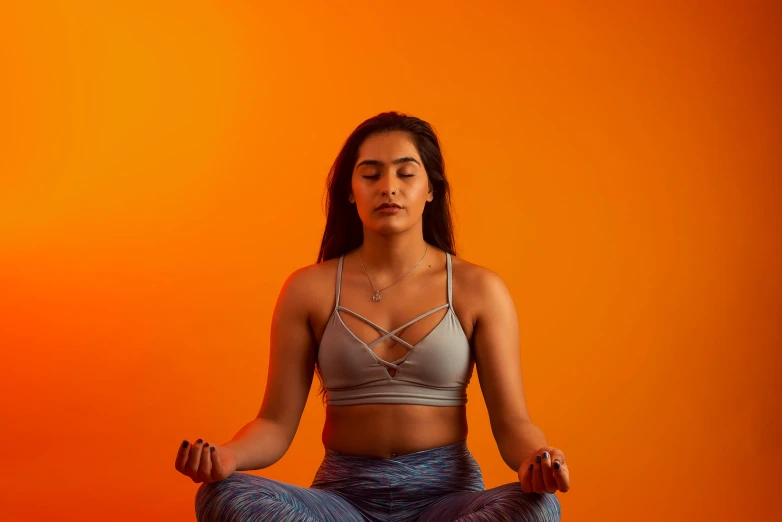 the woman in the yoga position is posed