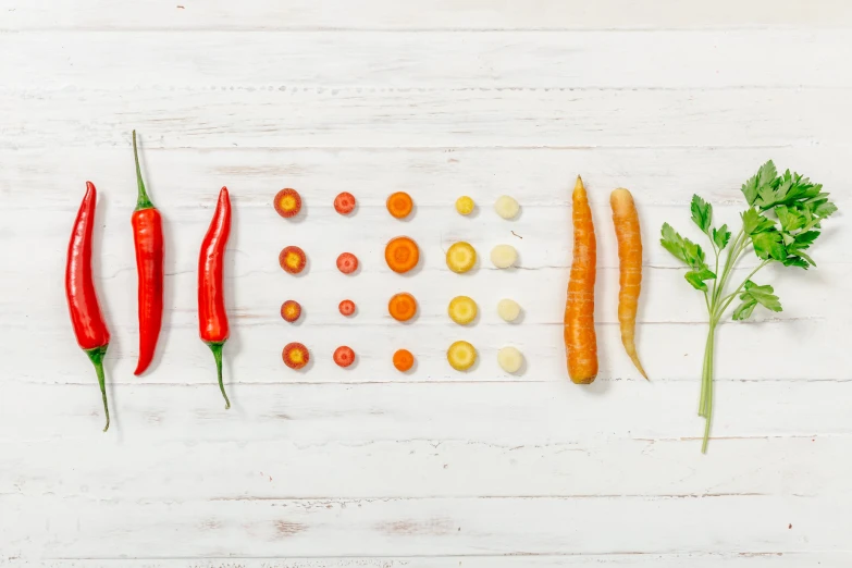 the vegetables that make up the carrots and other foods are arranged on the counter