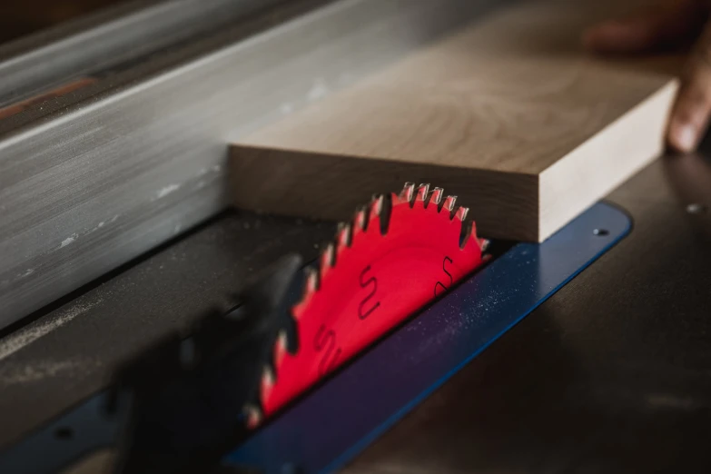 a piece of wood being cut by a router