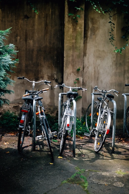 three bikes that are parked next to each other