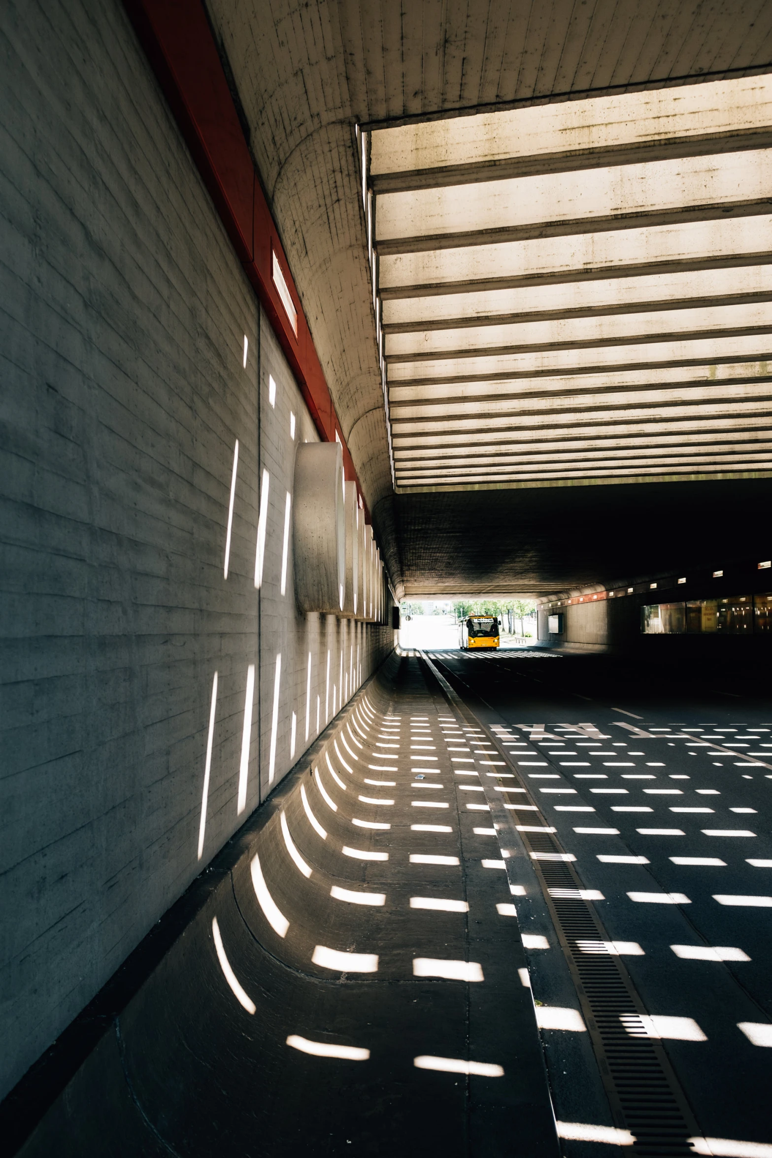 a tunnel that has light shining on it