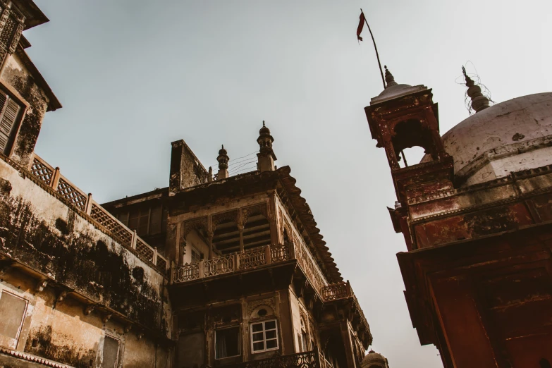 an old building with towers and balconies