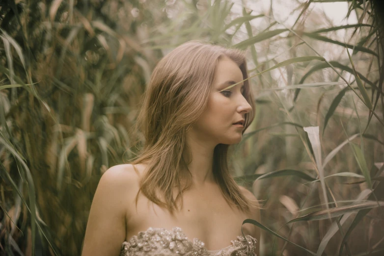 the woman with long hair has flowers on her head