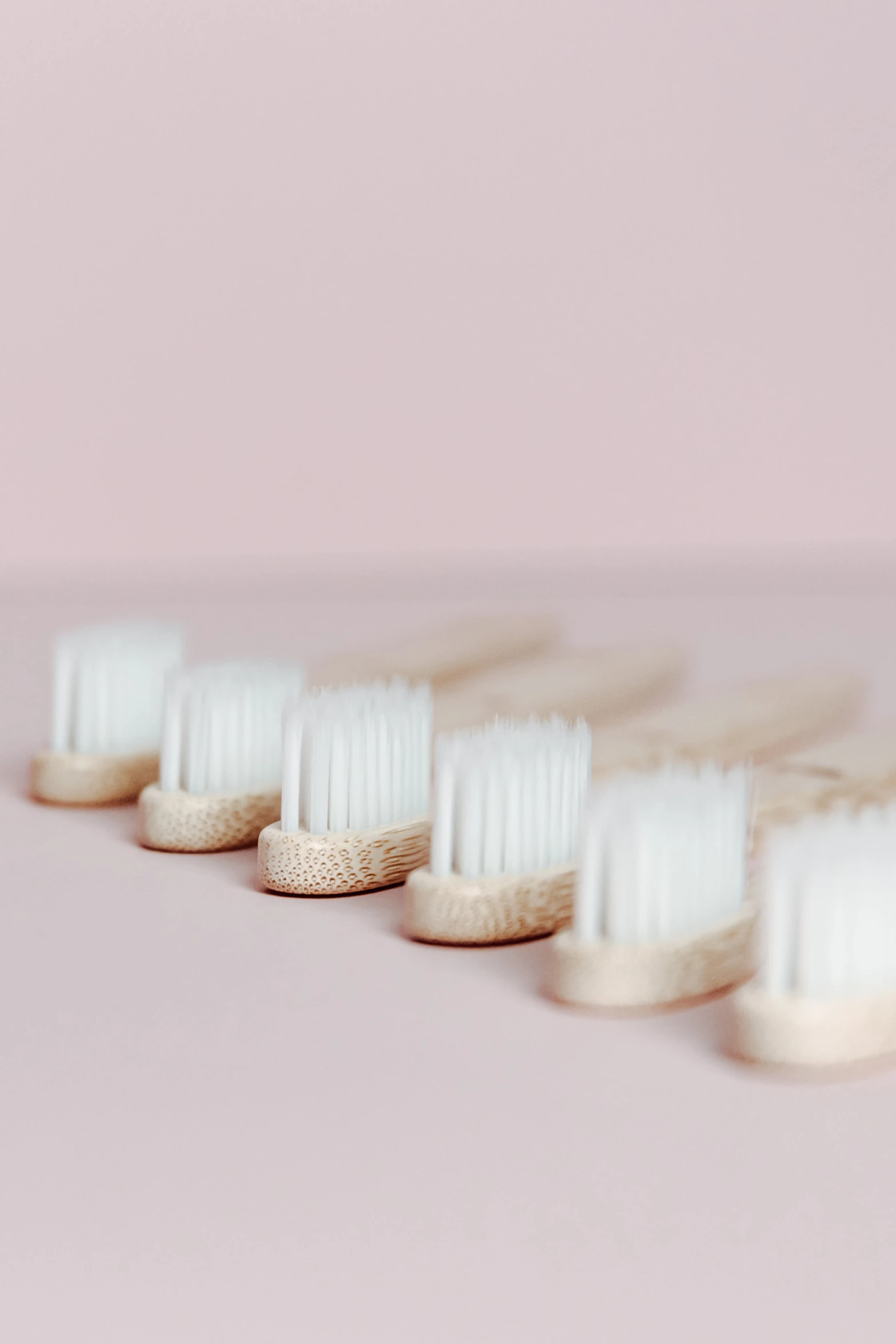 a row of tooth brushes next to one another