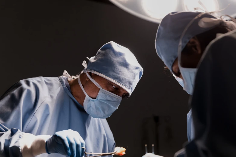 two doctors doing  on an injured patient