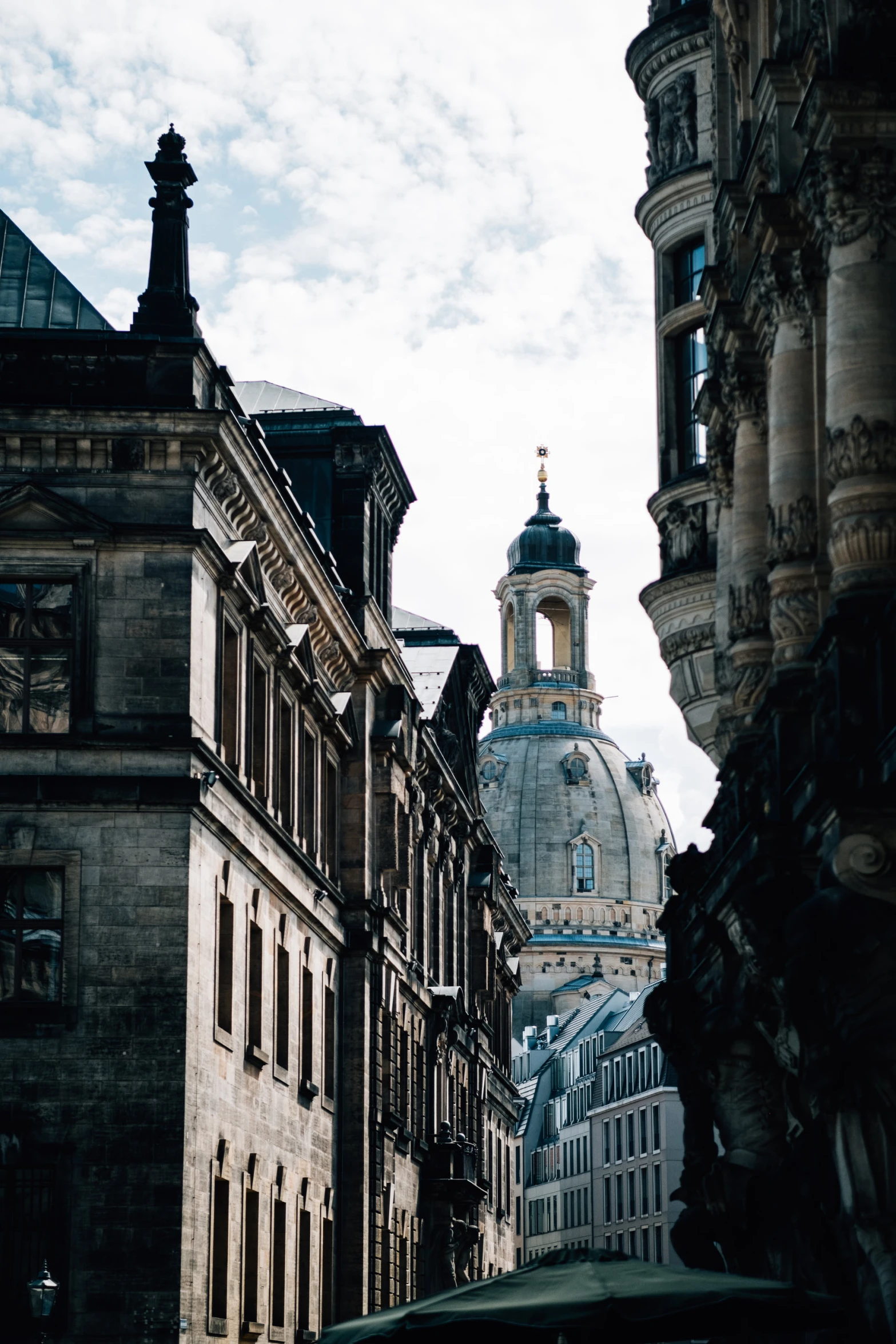 the view of a building down the street from the old one