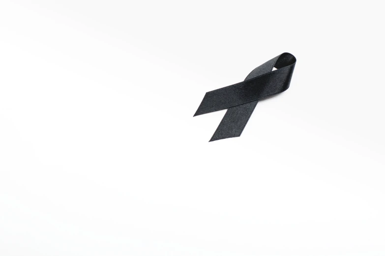 an empty black ribbon on white background