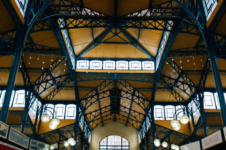 an atrium with high windows and many lights