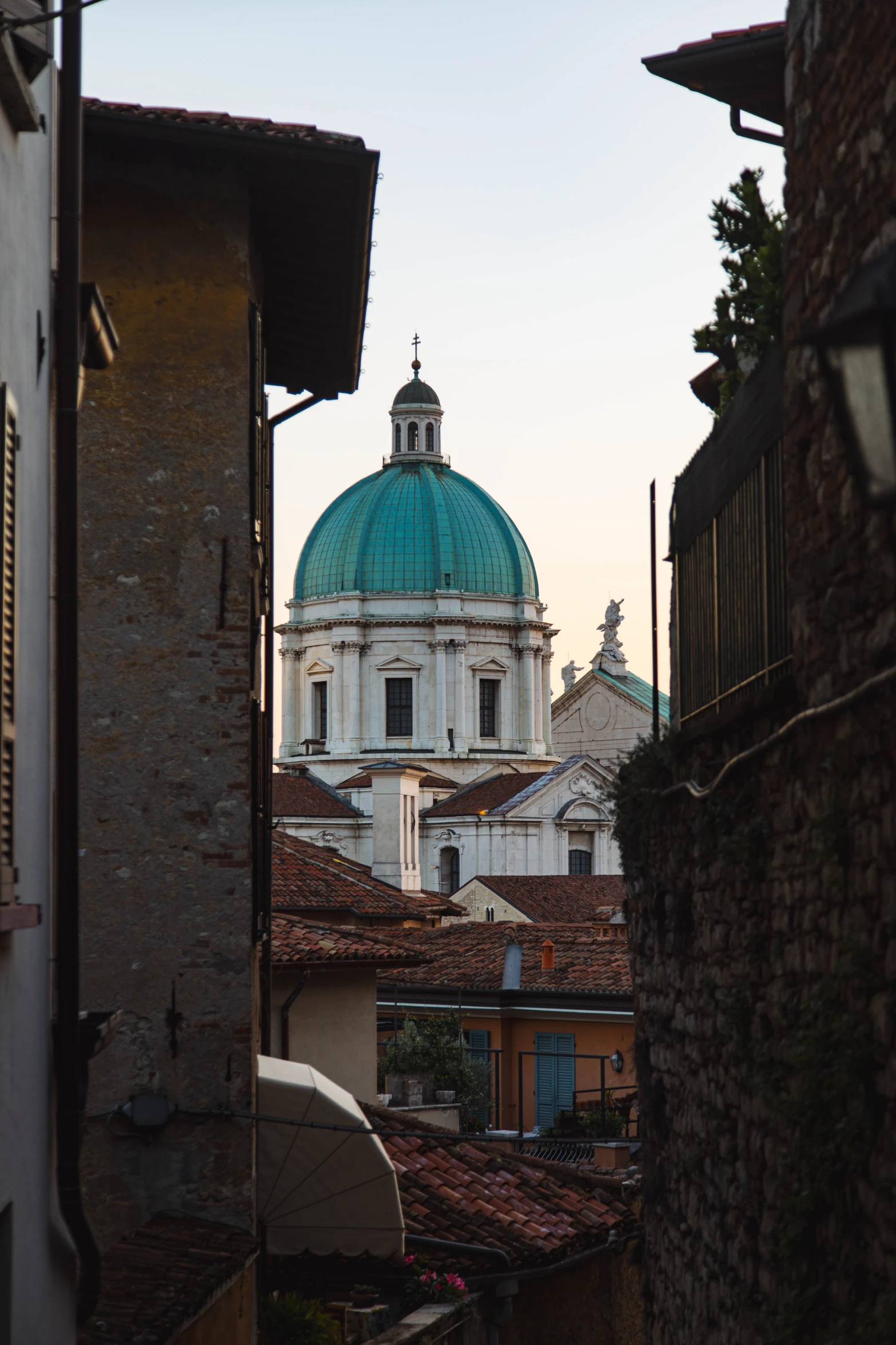 a large church tower towering over the city