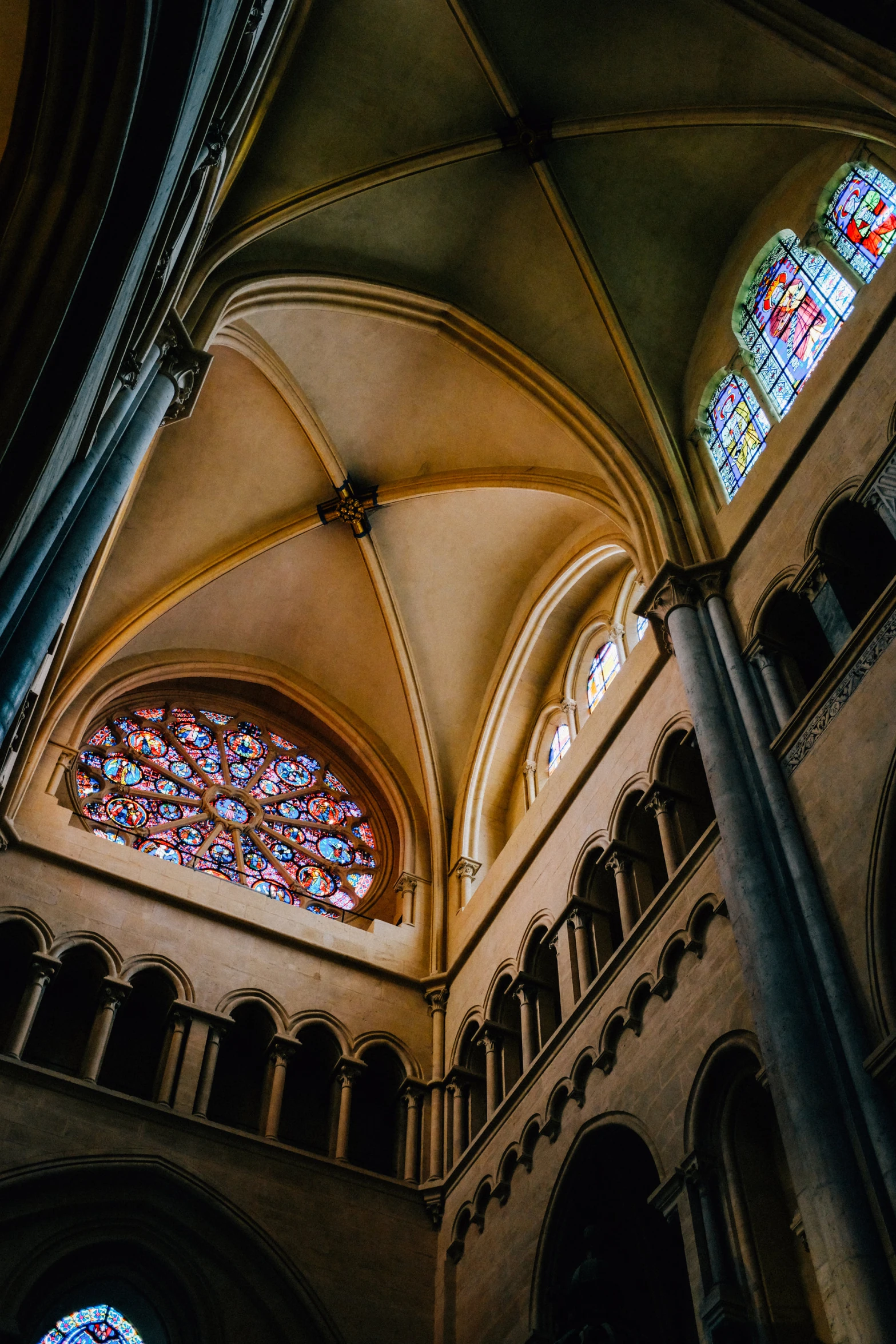 an old cathedral with the windows all lit up