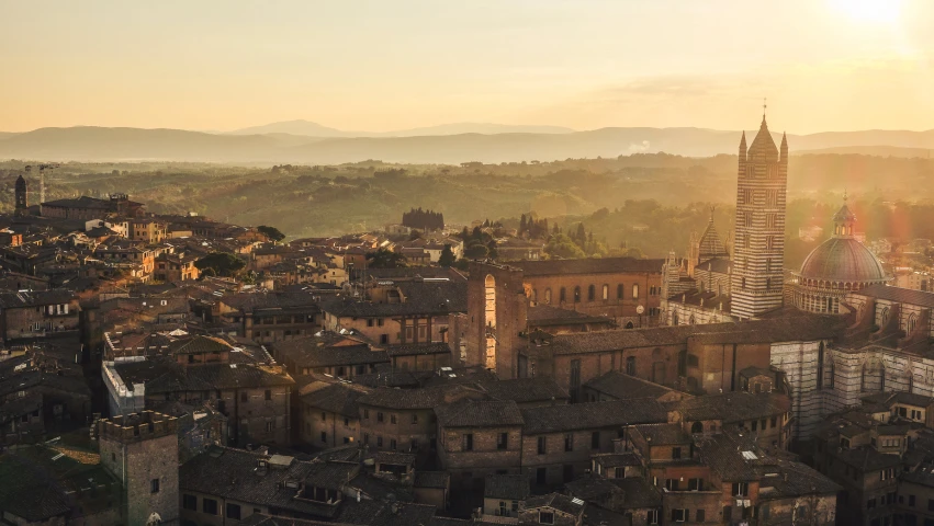 an overview view of a town with old buildings in the background