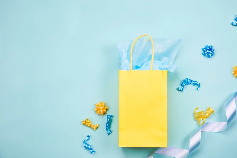 a yellow bag is in the middle of decorations