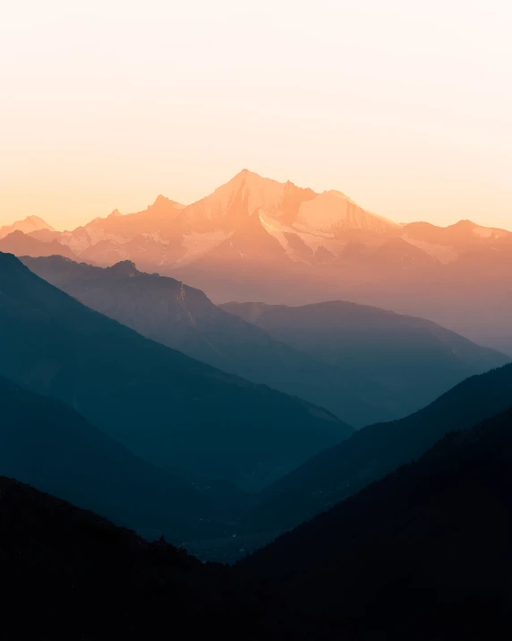 a view from high up on the mountains, at sunrise