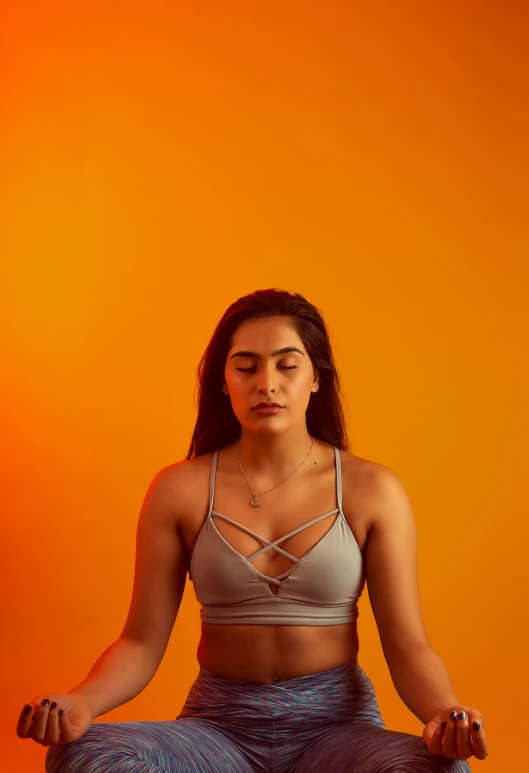 woman sitting in a yoga pose