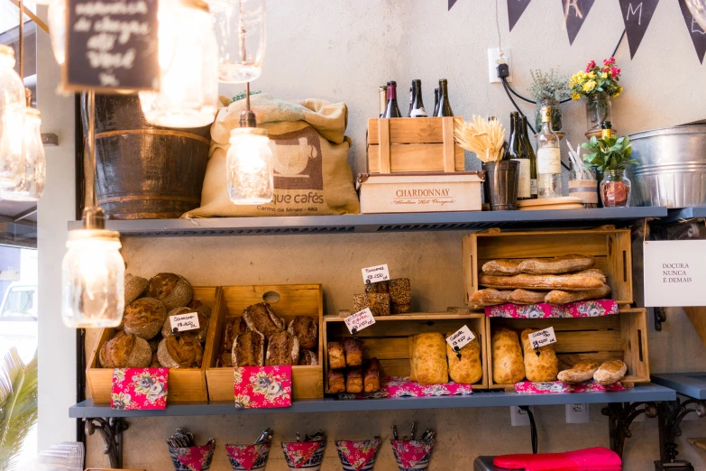 a bakery display of a variety of breads, pies, buns, and cakes