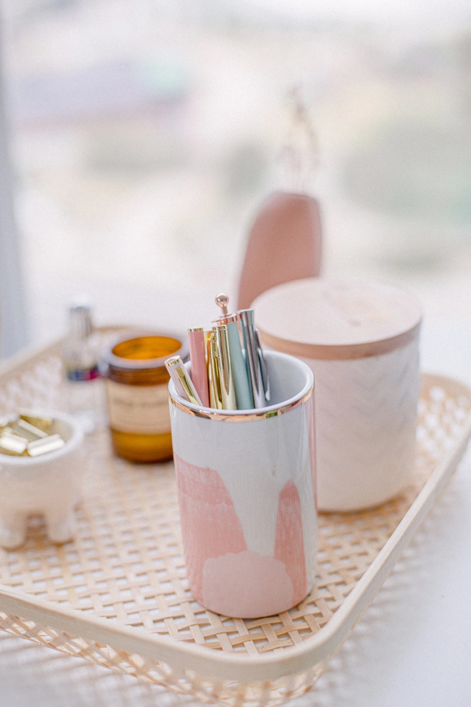 a couple of cups that are on a tray