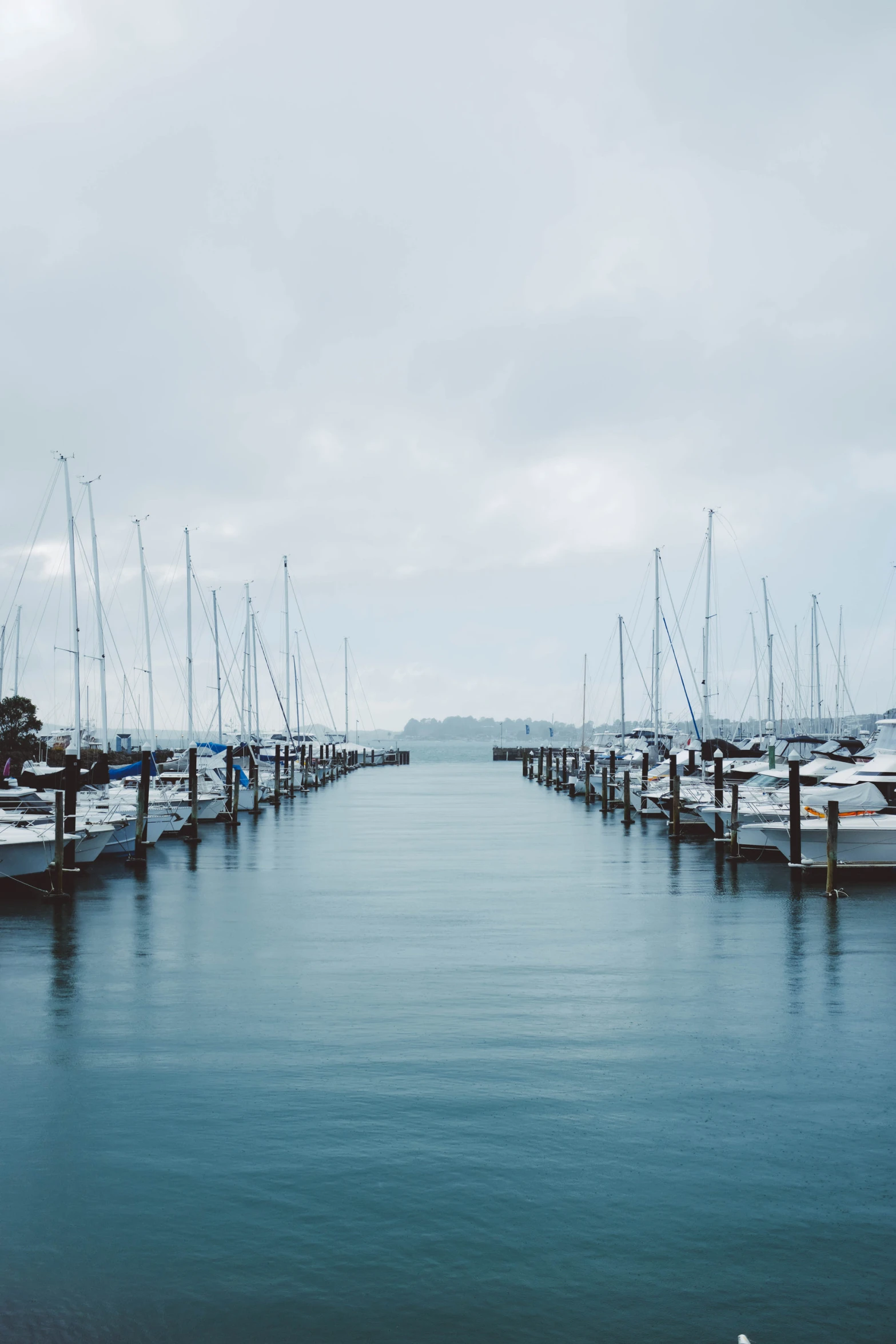 a couple of boats parked at a pier