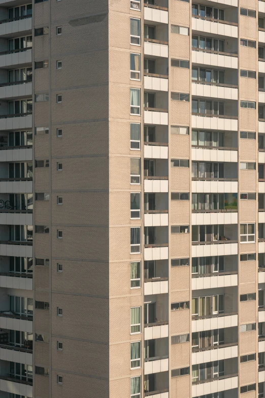 a tall building near by a large body of water