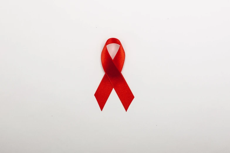 a red ribbon on a white background