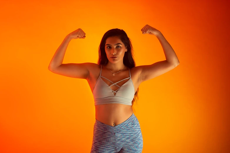 a young woman in sports  top and shorts