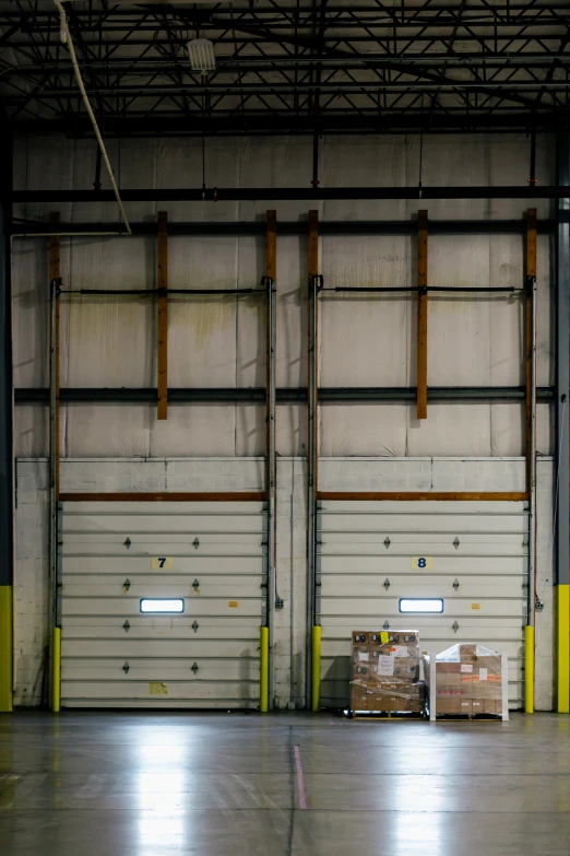 large garage with many crates inside the room