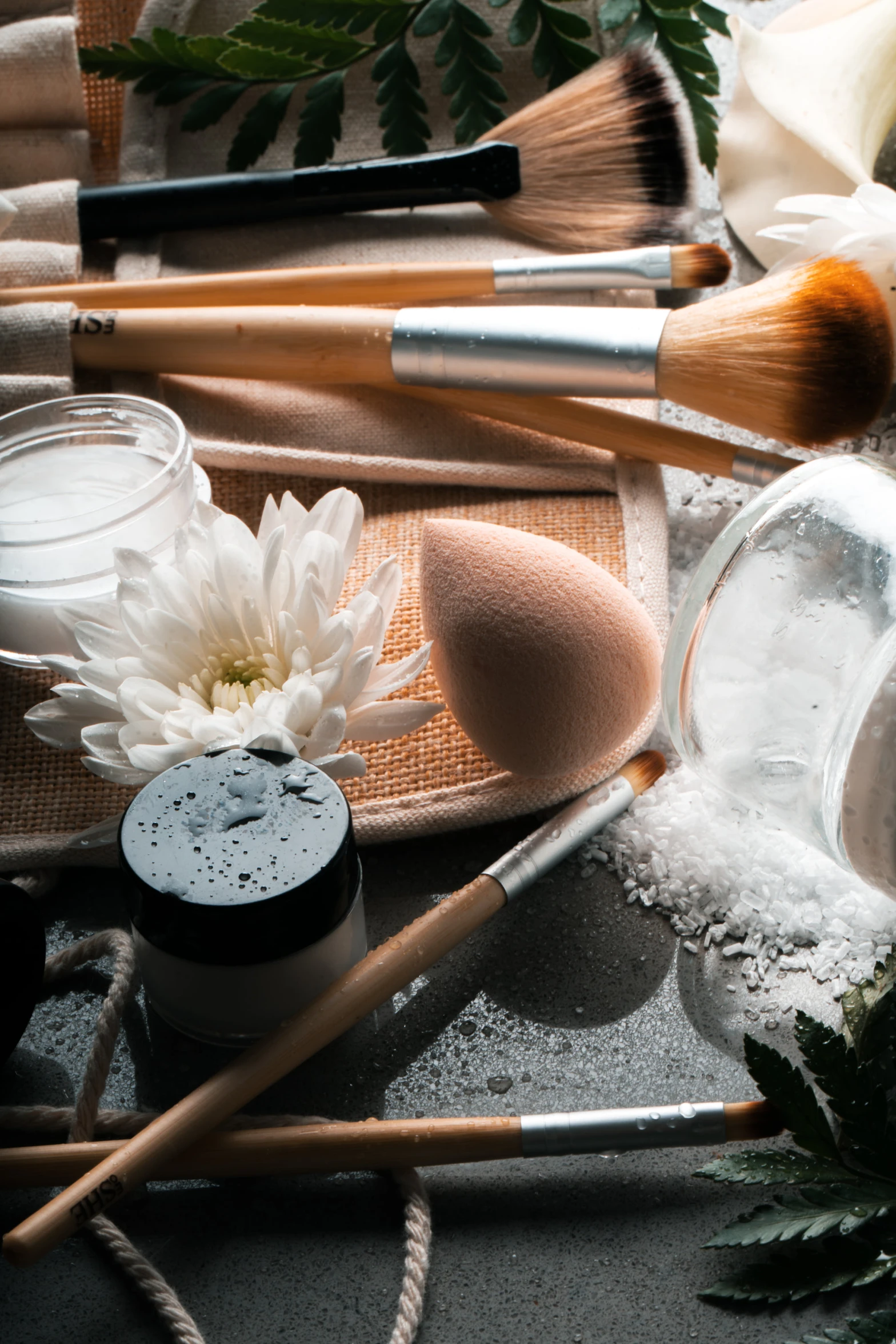a bouquet of makeup, make - up and other items are sitting around