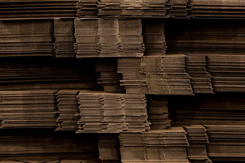 a stack of old newspapers stacked next to each other