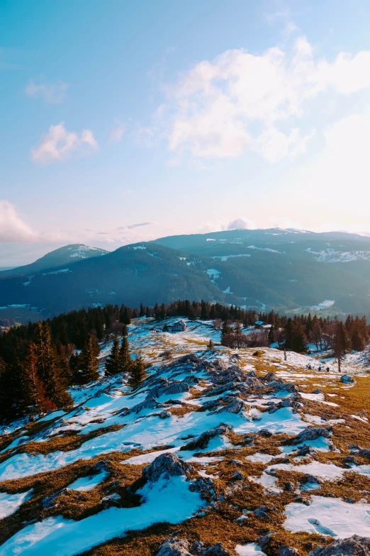 a view from the top of a snow covered hill