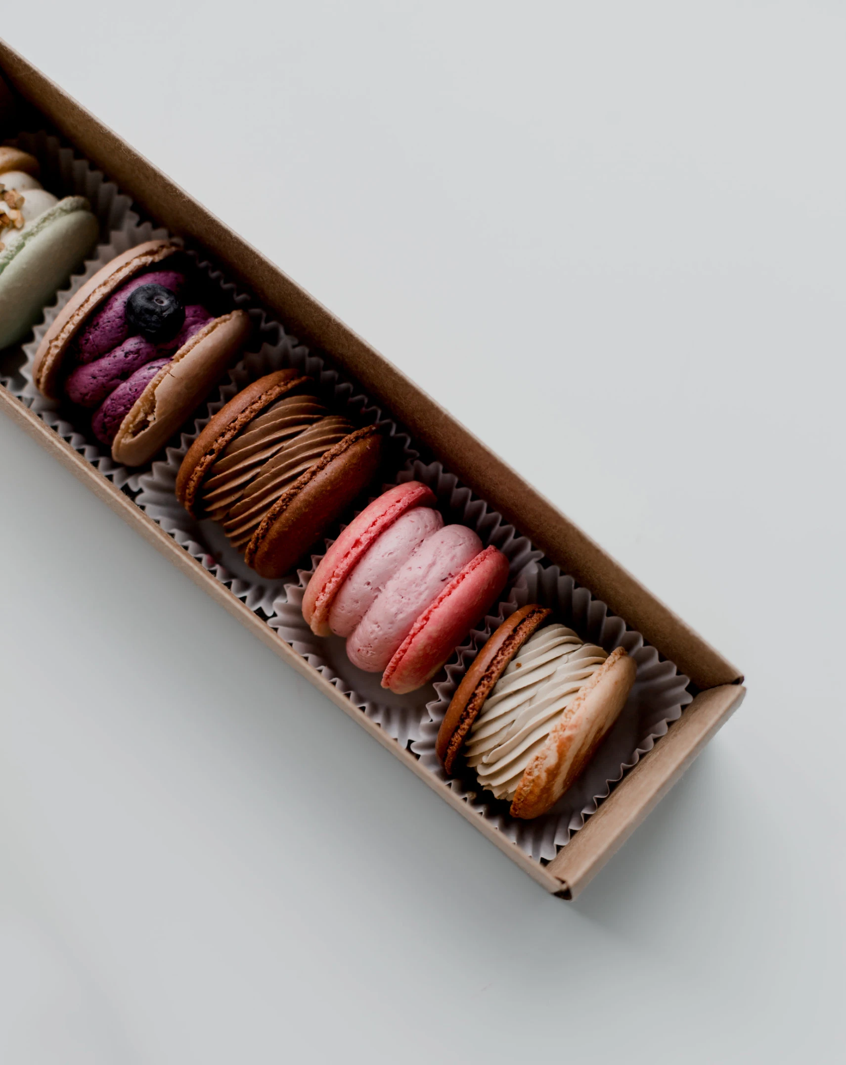 a box full of different types of cookies