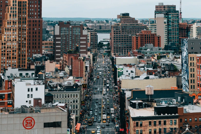 aerial view of city buildings and traffic on street