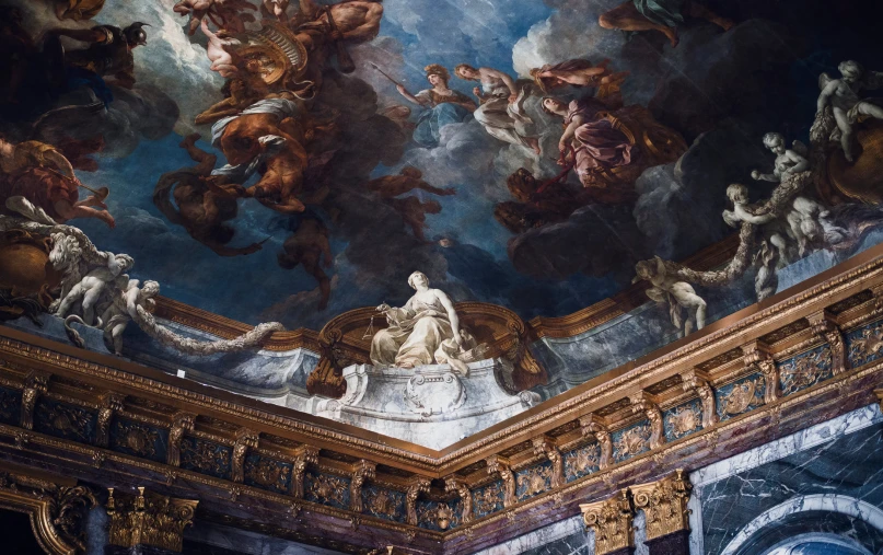 an elaborate painted ceiling in a building