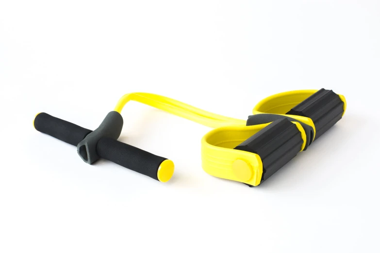 a pair of gym straps that have both yellow and black handles