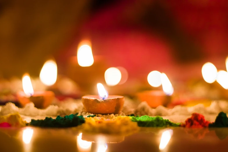 the small candles have been decorated in various colors