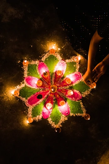 there is a large bright decorative flower with lights on it