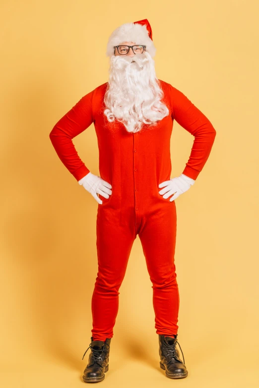man in red and white santa suit standing with hands on his hips