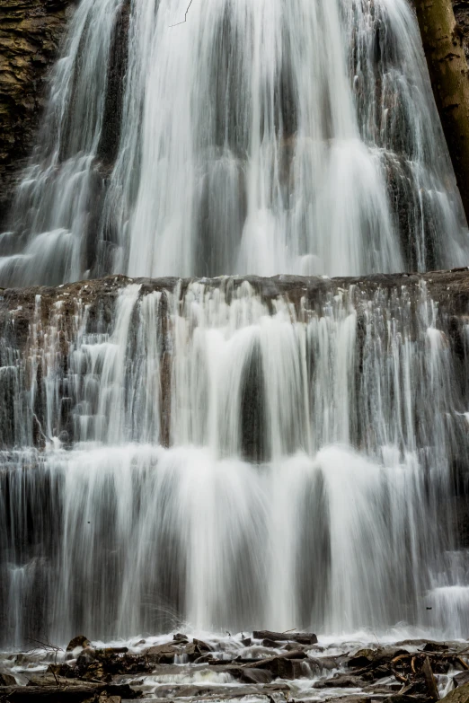 there is some water coming down the side of this waterfall