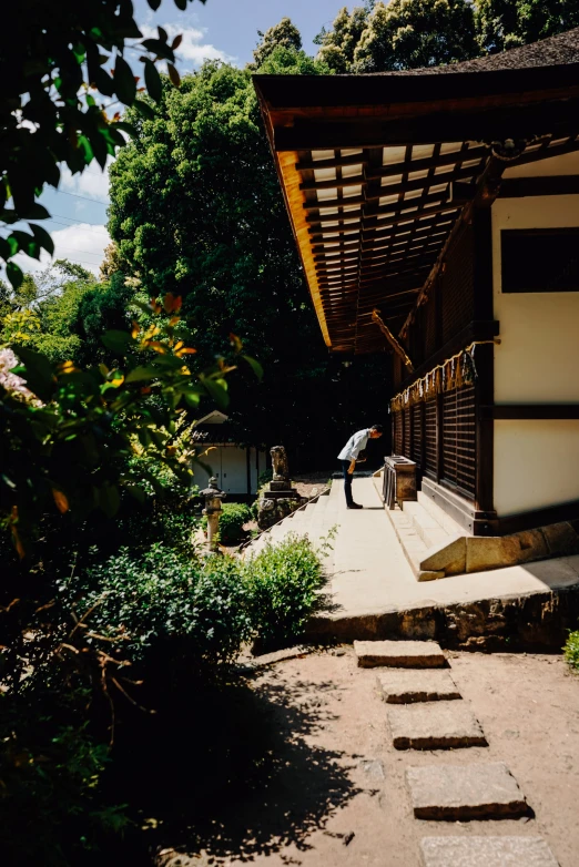 a woman that is on some steps in the dirt