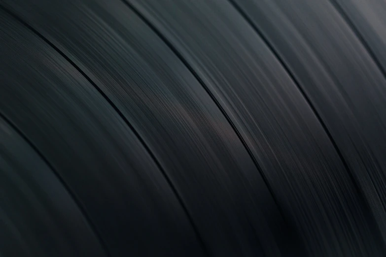 a close up of a black metal plate