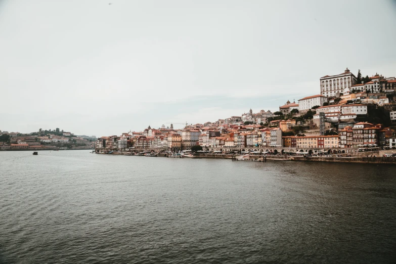 the river side is full of houses and boats